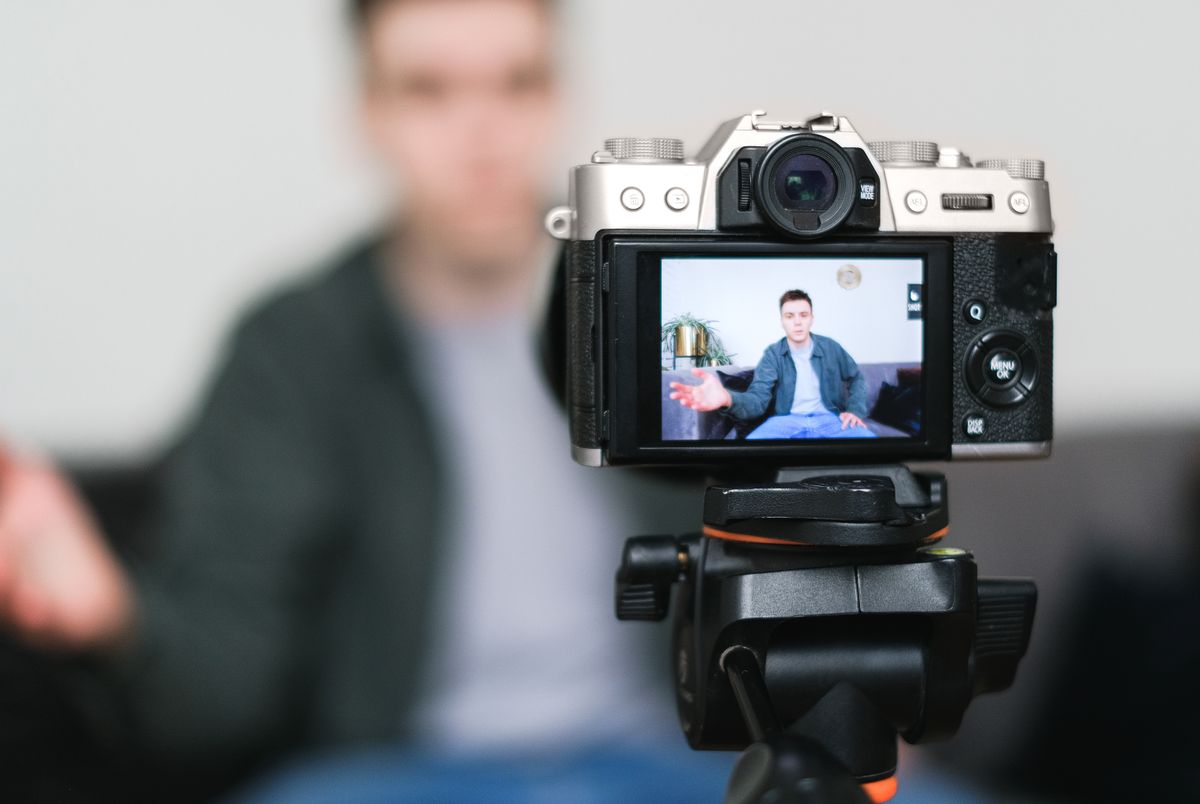 Marketing executive filming customer interview content — careers at MedicalMet